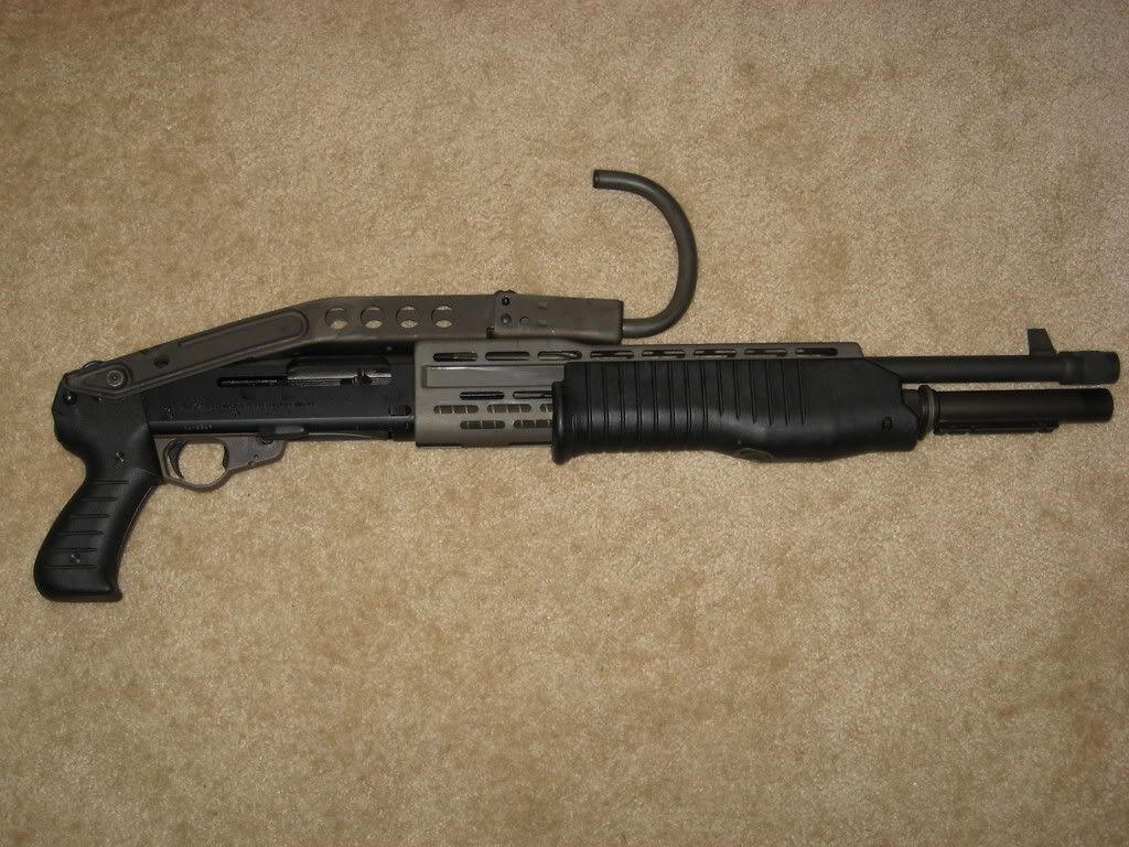 Top folding stock for a Mossberg 590 (with ghost ring sights)